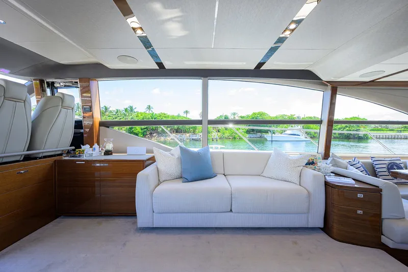 Slide: The Image of Luxurious interior of 2020 Princess F70 yacht with elegant seating and scenic window view. - 23