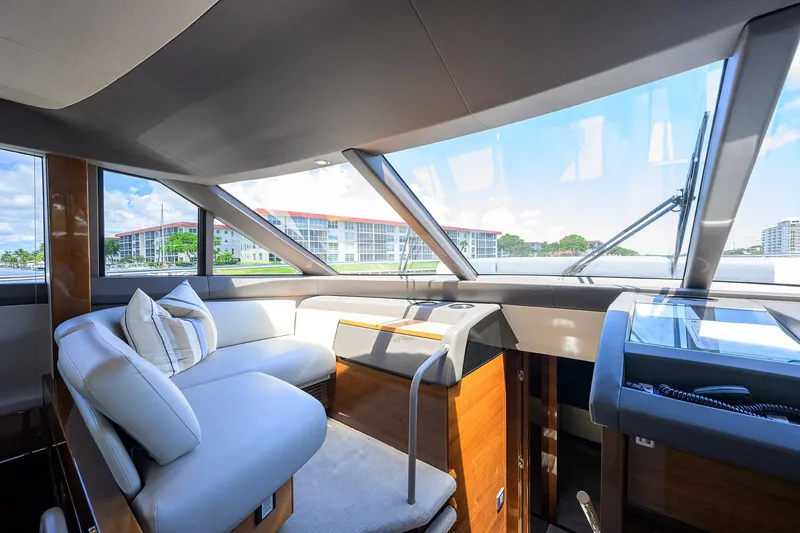 Slide: The Image of Luxurious interior of 2020 Princess F70 yacht with modern seating and panoramic windows. - 24