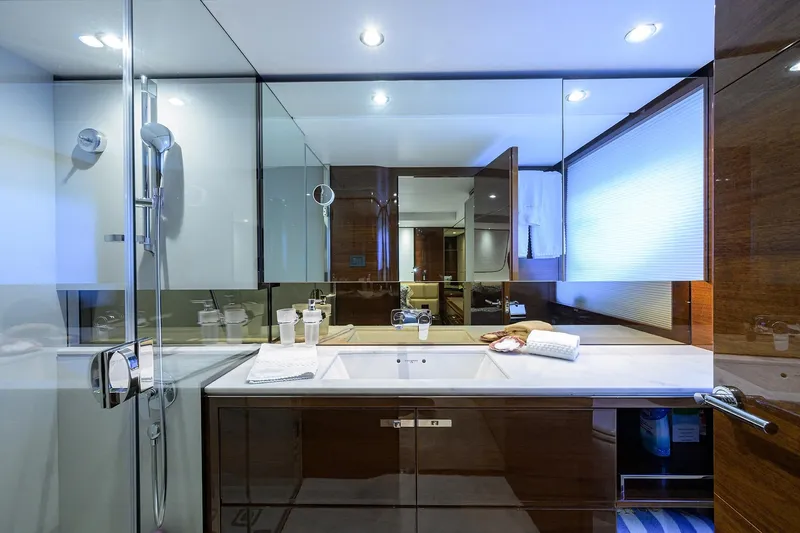 Slide: The Image of Luxurious bathroom interior on a 2020 Princess F70 yacht, featuring modern fixtures and elegant design. - 43