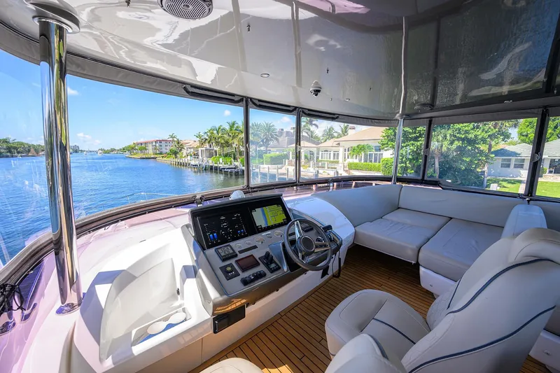 Slide: The Image of Luxurious 2020 Princess F70 yacht interior with modern helm and spacious seating area. - 57