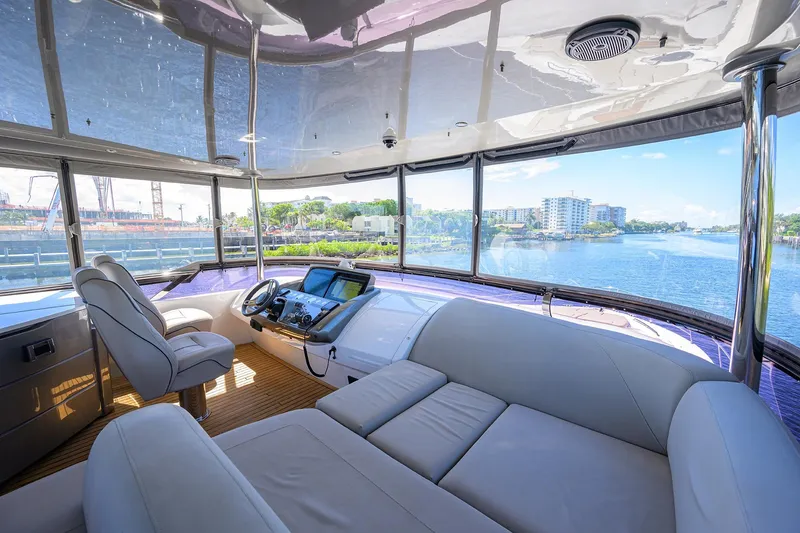 Slide: The Image of Luxurious 2020 Princess F70 yacht interior with panoramic water views and modern helm. - 58