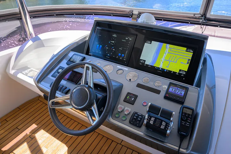 Slide: The Image of Cockpit of 2020 Princess F70 yacht with advanced navigation and control systems. - 60