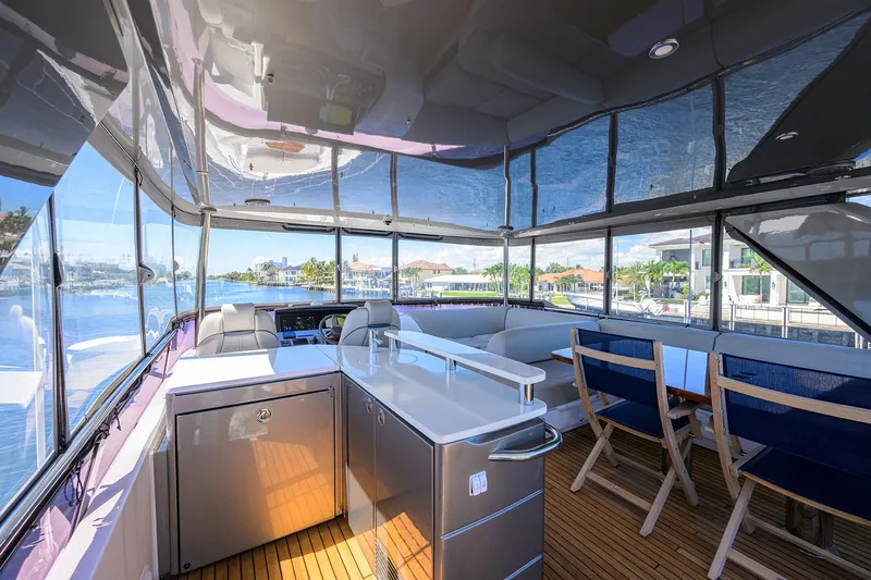 Slide: The Image of Luxurious interior of 2020 Princess F70 yacht with modern seating and panoramic views. - 63