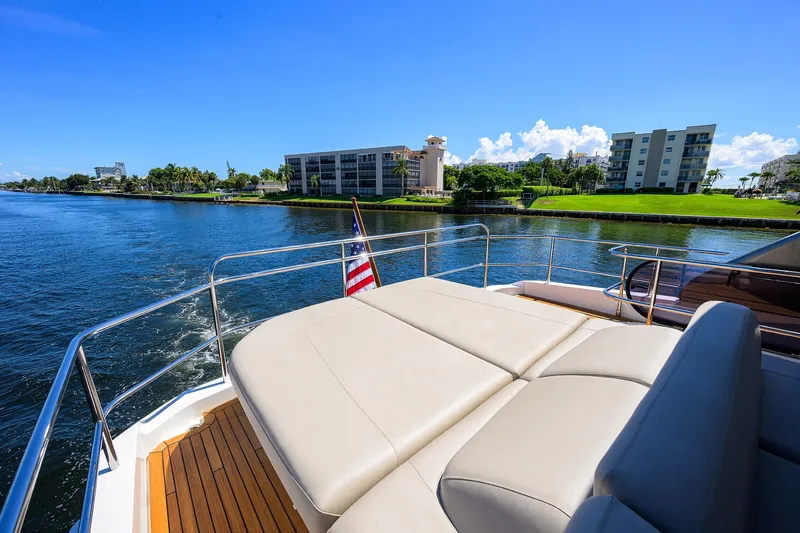 Slide: The Image of Luxurious 2020 Princess F70 yacht deck with scenic waterfront view. - 67