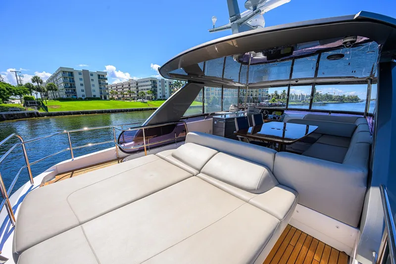 Slide: The Image of Luxurious 2020 Princess F70 yacht with spacious deck and waterfront view. - 68