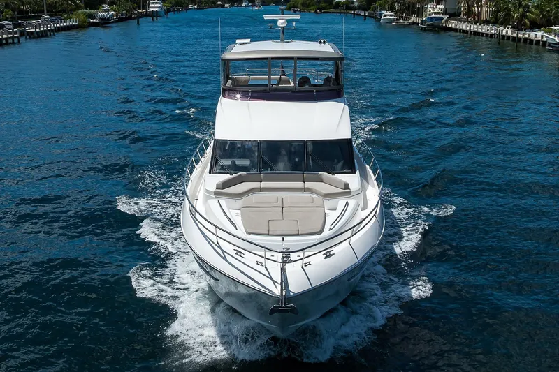 Slide: The Image of Luxury 2020 Princess F70 yacht cruising on a scenic waterway. - 7