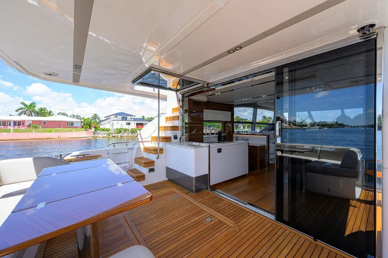 Slide: The Image of Luxurious 2020 Princess F70 yacht interior with sleek design and waterfront view. - 71