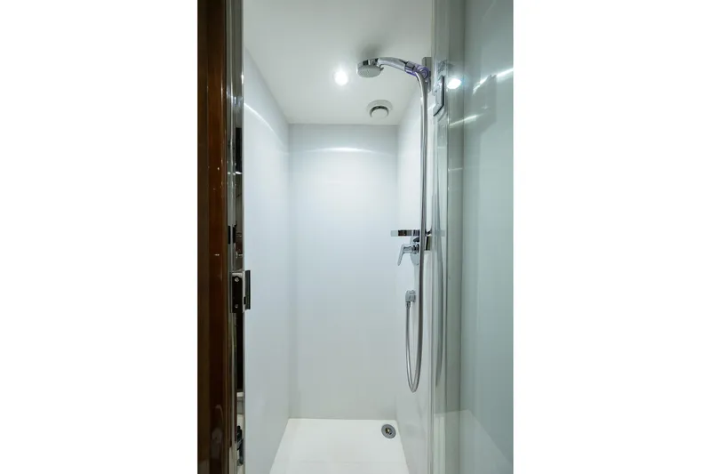Slide: The Image of Modern shower area in a 2020 Princess F70 yacht, featuring sleek design and chrome fixtures. - 93