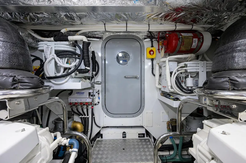 Slide: The Image of Engine room of 2020 Princess F70 yacht with advanced equipment and safety features. - 96