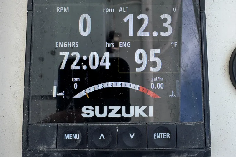 Slide: The Image of Suzuki engine display showing 72 engine hours on 1984 Grady-White Offshore 24 boat. - 16