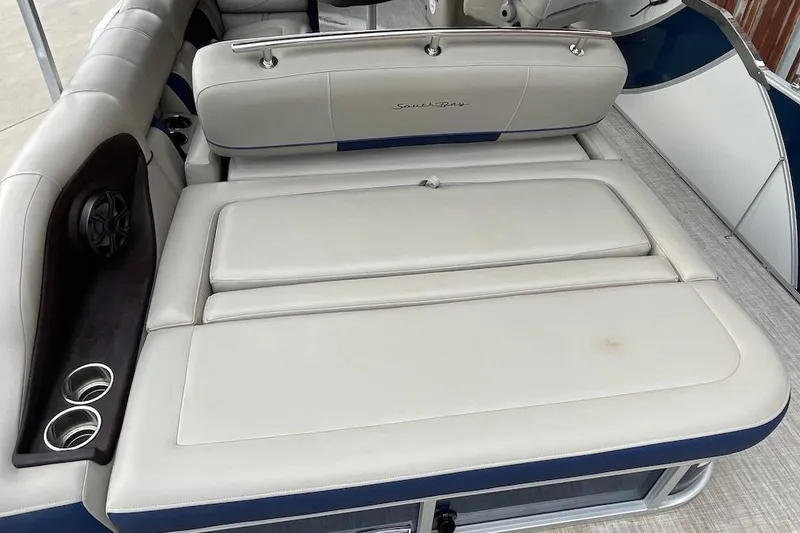 Slide: The Image of 2020 South Bay 523 boat with beige seating and cup holders. - 5