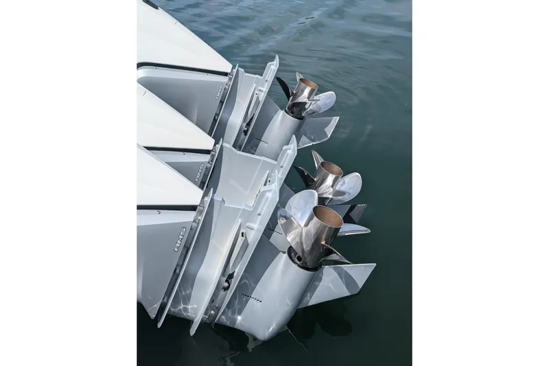 Slide: The Image of 2015 Yellowfin RIB boat with multiple outboard propellers in water. - 22
