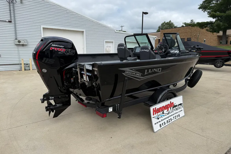 Slide: The Image of 2026 Lund 1800 Explorer Sport boat with Mercury Pro XS engine on trailer. - 7