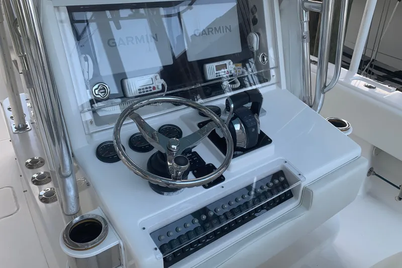 Slide: The Image of Console of 2008 Invincible 36 CC boat with Garmin navigation system. - 13