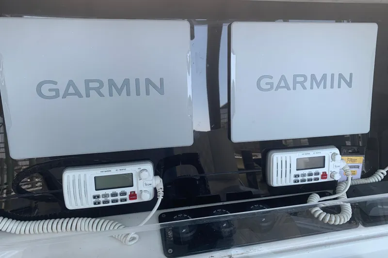 Slide: The Image of Dual Garmin displays and radios on Invincible 36 CC, 2008 model. - 14