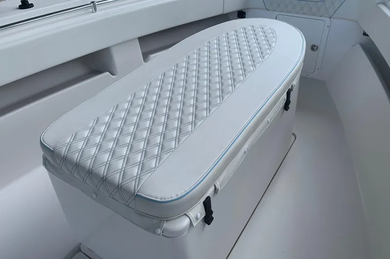 Slide: The Image of Padded seat on 2008 Invincible 36 CC boat, featuring diamond-stitched upholstery. - 24