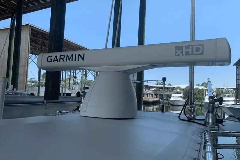Slide: The Image of Garmin xHD radar on 2008 Invincible 36 CC boat docked at marina. - 34