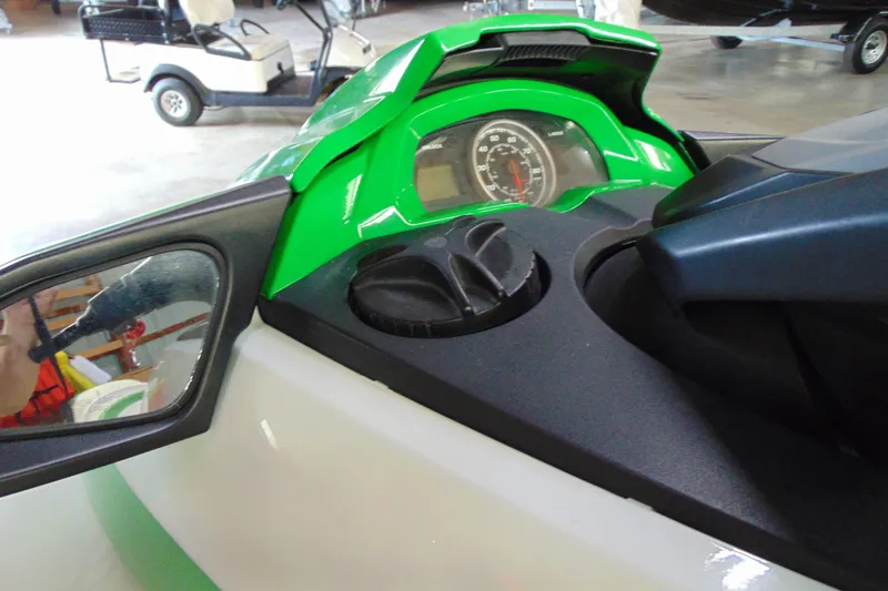 Slide: The Image of 2014 Yamaha WaveRunner FX HO dashboard with green accents and speedometer. - 6