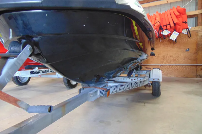 Slide: The Image of 2014 Yamaha WaveRunner FX HO on trailer in storage with life jackets. - 8