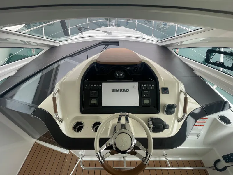 Slide: The Image of 2018 Beneteau Gran Turismo 40 helm with Simrad navigation system. - 23
