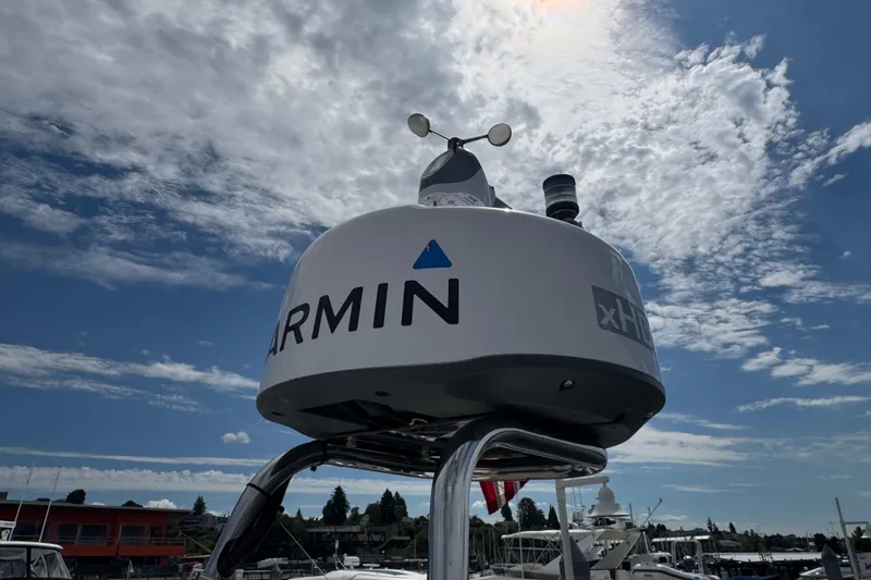 Slide: The Image of Garmin radar on 2020 Cutwater C-30 CB boat under a partly cloudy sky. - 38