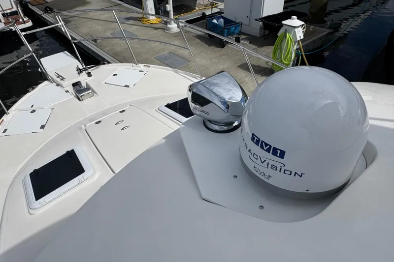 Slide: The Image of 2020 Cutwater C-30 CB boat with TracVision TV1 satellite dome at dock. - 39