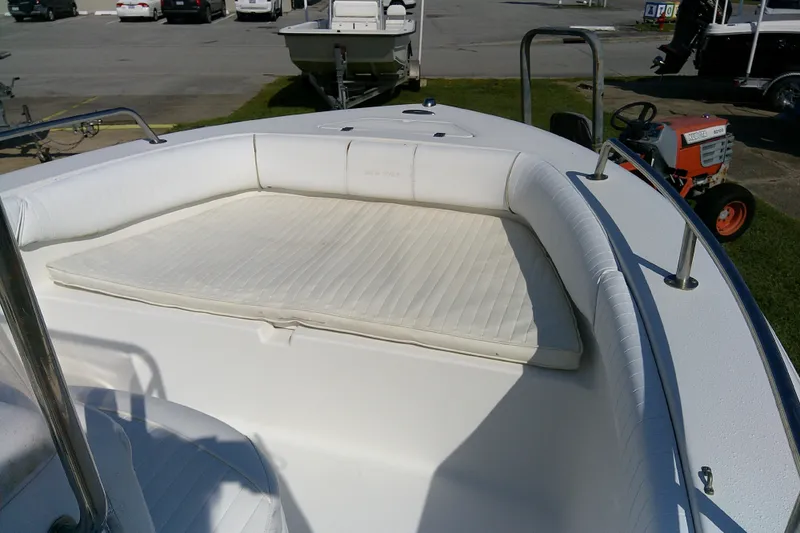 Slide: The Image of 2007 Sea Pro 186 CC boat with white cushioned seating area. - 13