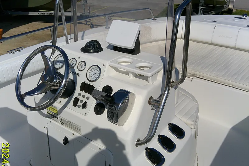 Slide: The Image of 2007 Sea Pro 186 CC boat console with steering wheel and gauges. - 14