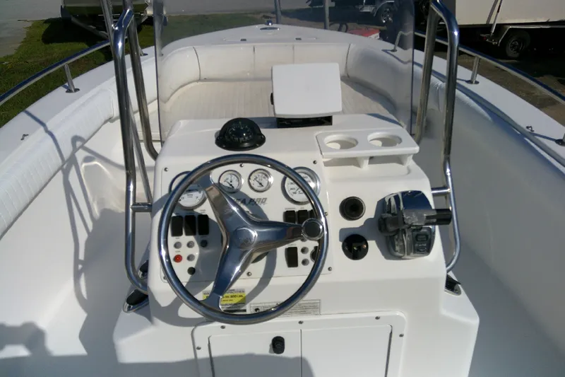 Slide: The Image of 2007 Sea Pro 186 CC boat console with steering wheel and gauges. - 21