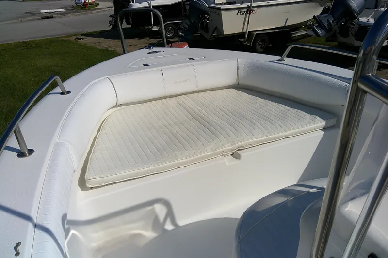 Slide: The Image of 2007 Sea Pro 186 CC boat with cushioned seating in the bow area. - 11