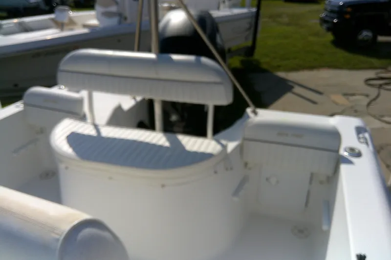Slide: The Image of 2007 Sea Pro 186 CC boat interior with white seating and console. - 18