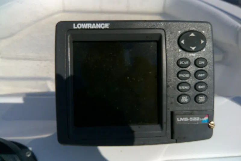 Slide: The Image of Lowrance LMS-522 fishfinder on 2007 Sea Pro 186 CC boat dashboard. - 22