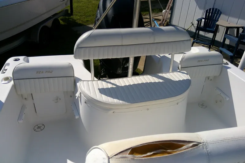 Slide: The Image of 2007 Sea Pro 186 CC boat interior with white seating and console. - 23