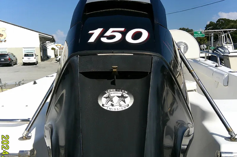 Slide: The Image of 2007 Sea Pro 186 CC boat with 150 horsepower engine, very low emission label. - 8