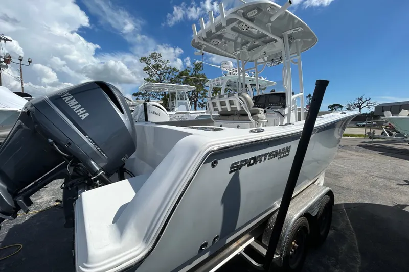 Slide: The Image of 2021 Sportsman Open 232 Center Console boat with Yamaha engine on trailer. - 7