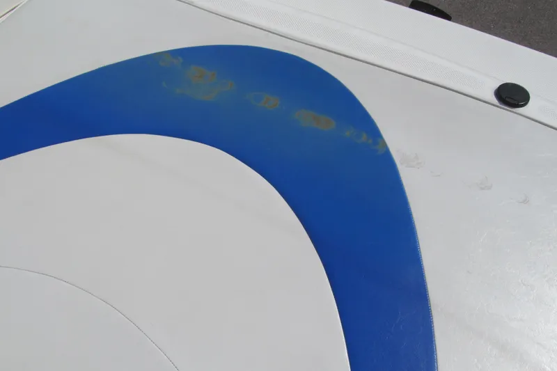 Slide: The Image of Close-up of 2007 Bayliner 185 boat seat with blue and white upholstery. - 13