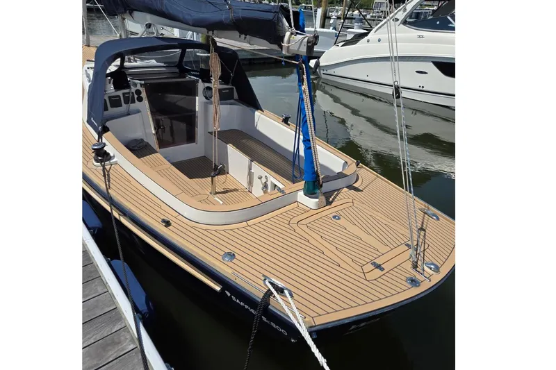Slide: The Image of 2019 Saffier Sc 8.0m Cabin sailboat docked, featuring sleek deck design and modern amenities. - 3