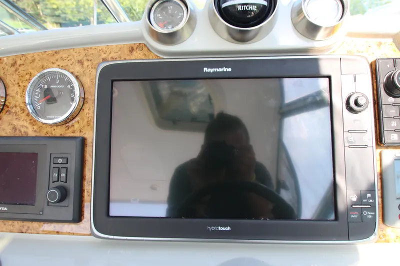 Slide: The Image of Dashboard of a 2012 Formula 400 Super Sport with Raymarine electronics. - 16