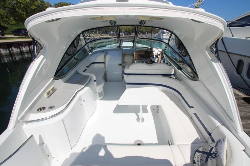 Slide: The Image of 2012 Formula 400 Super Sport boat interior with white seating and modern design. - 29