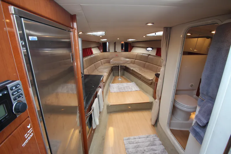 Slide: The Image of Interior of 2012 Formula 400 Super Sport yacht with seating area and kitchenette. - 34