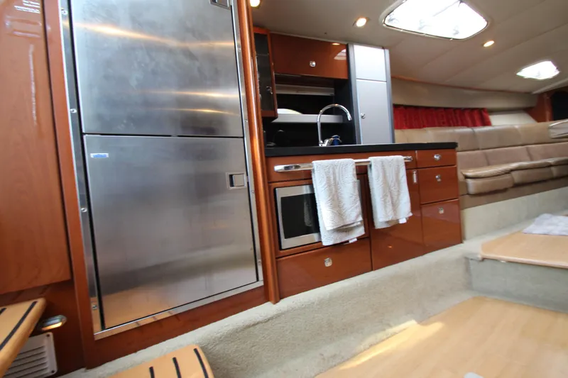 Slide: The Image of 2012 Formula 400 Super Sport yacht interior kitchen with stainless steel appliances. - 37