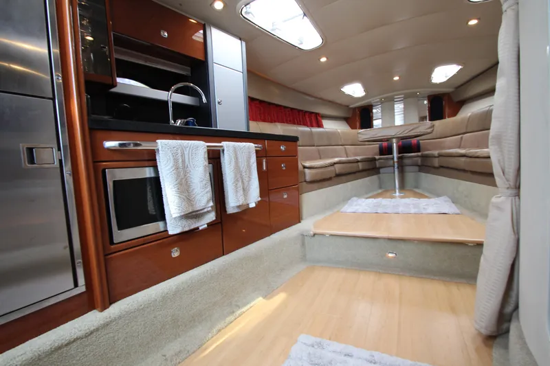 Slide: The Image of Interior of a 2012 Formula 400 Super Sport yacht with kitchen and seating area. - 38