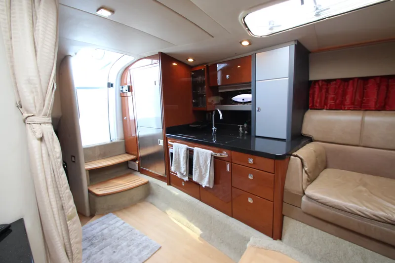 Slide: The Image of Interior of a 2012 Formula 400 Super Sport yacht with modern kitchen and seating area. - 39