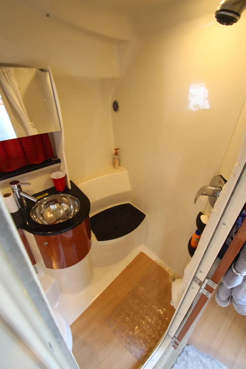 Slide: The Image of 2012 Formula 400 Super Sport boat bathroom with sink and shower - 46