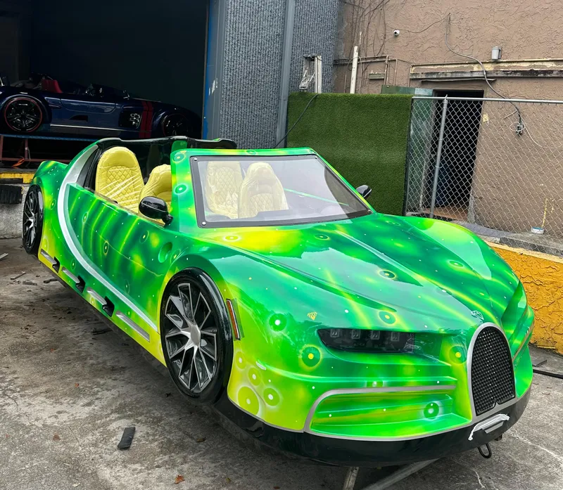 The Image of 2023 Watersports Car Series B with vibrant green custom paint parked outdoors. - 1