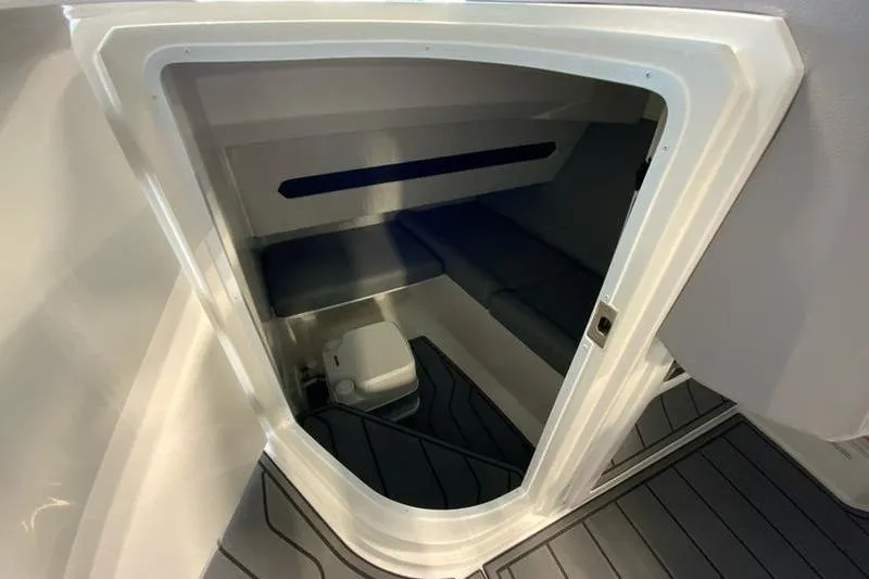 Slide: The Image of Interior cabin of 2026 Cobalt A29 boat with seating and storage area. - 4