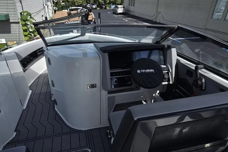 Slide: The Image of 2026 Cobalt A29 boat cockpit with modern controls and sleek design. - 9