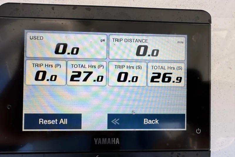 Slide: The Image of Yamaha display showing trip and total hours for Sea Hunt Ultra 305 SE, 2025 model. - 14