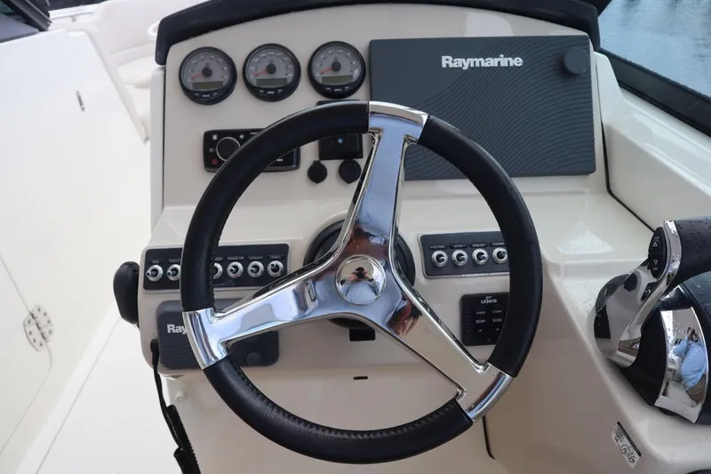 Slide: The Image of Steering console of 2017 Boston Whaler 270 Vantage with Raymarine electronics. - 10
