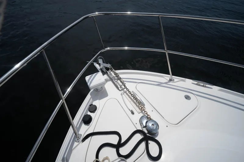 Slide: The Image of Bow of 2006 Sea Ray 48 Sundancer with anchor chain and railing. - 22